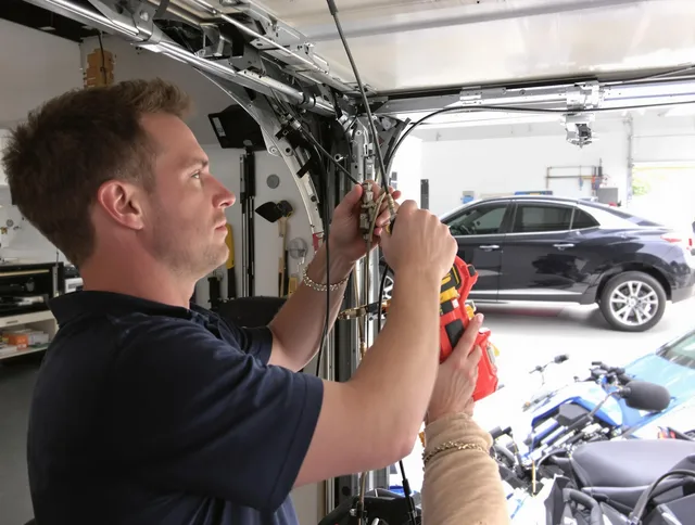 Palm Coast Garage Door Repair safety certified technician performing cable replacement in Palm Coast