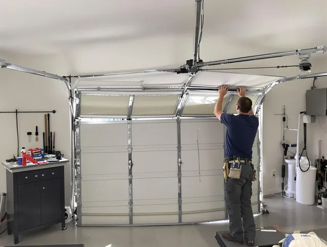 Palm Coast Garage Door Repair specialist performing precise section replacement on Palm Coast garage door