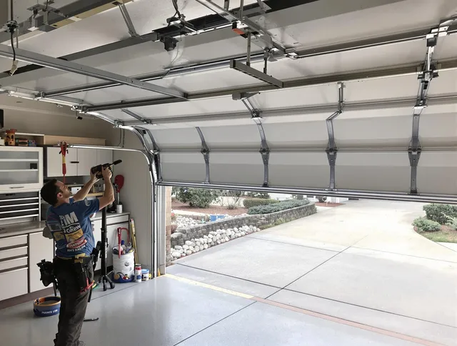 Garage door track repair service by Palm Coast Garage Door Repair in Palm Coast